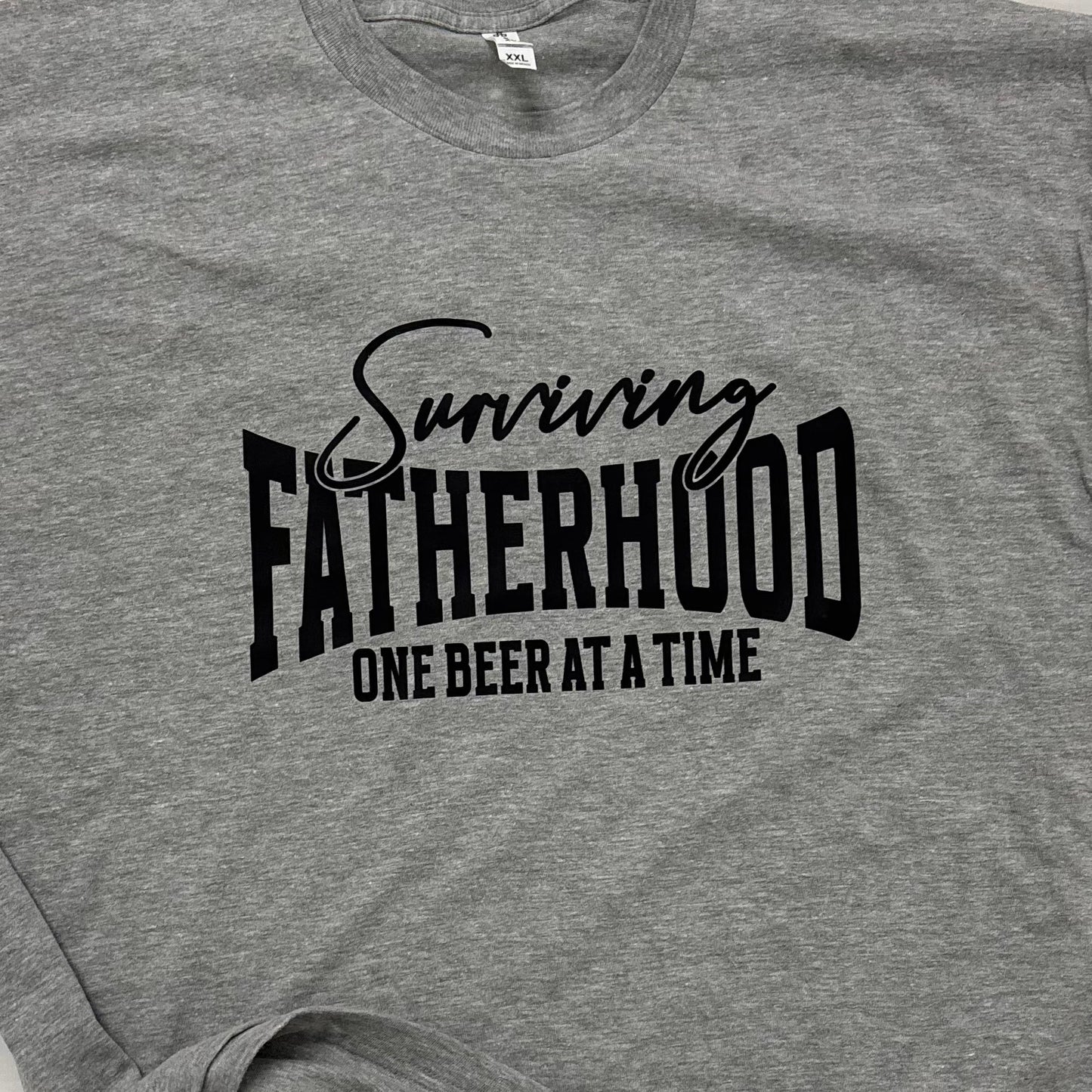 *Surviving Fatherhood Graphic Tee