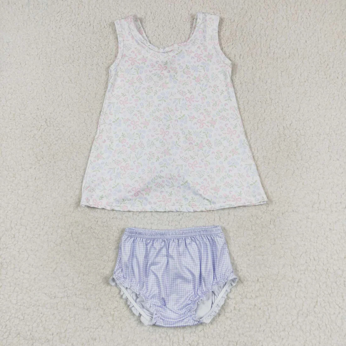 Swing back bloomer set with floral and bow patterned top. Purple gingham bloomers